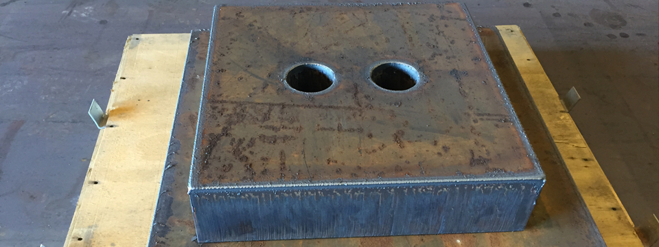 A36_ Steel_ Plate_ Fabricated_ holes - NYC_ Steel_ Plate_ Fabricators - Steel_ Plate_ Fabrication_ to_exact _ specifications