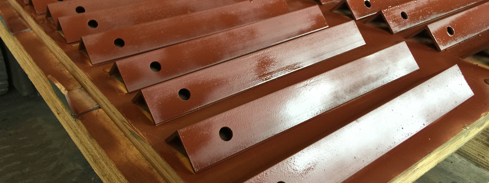 Fabricated_ Structural_ Steel_ angles_ holes_ in_ NY - Structural_ Steel_ Fabricators_ angle_ iron__ brackets_ NYC